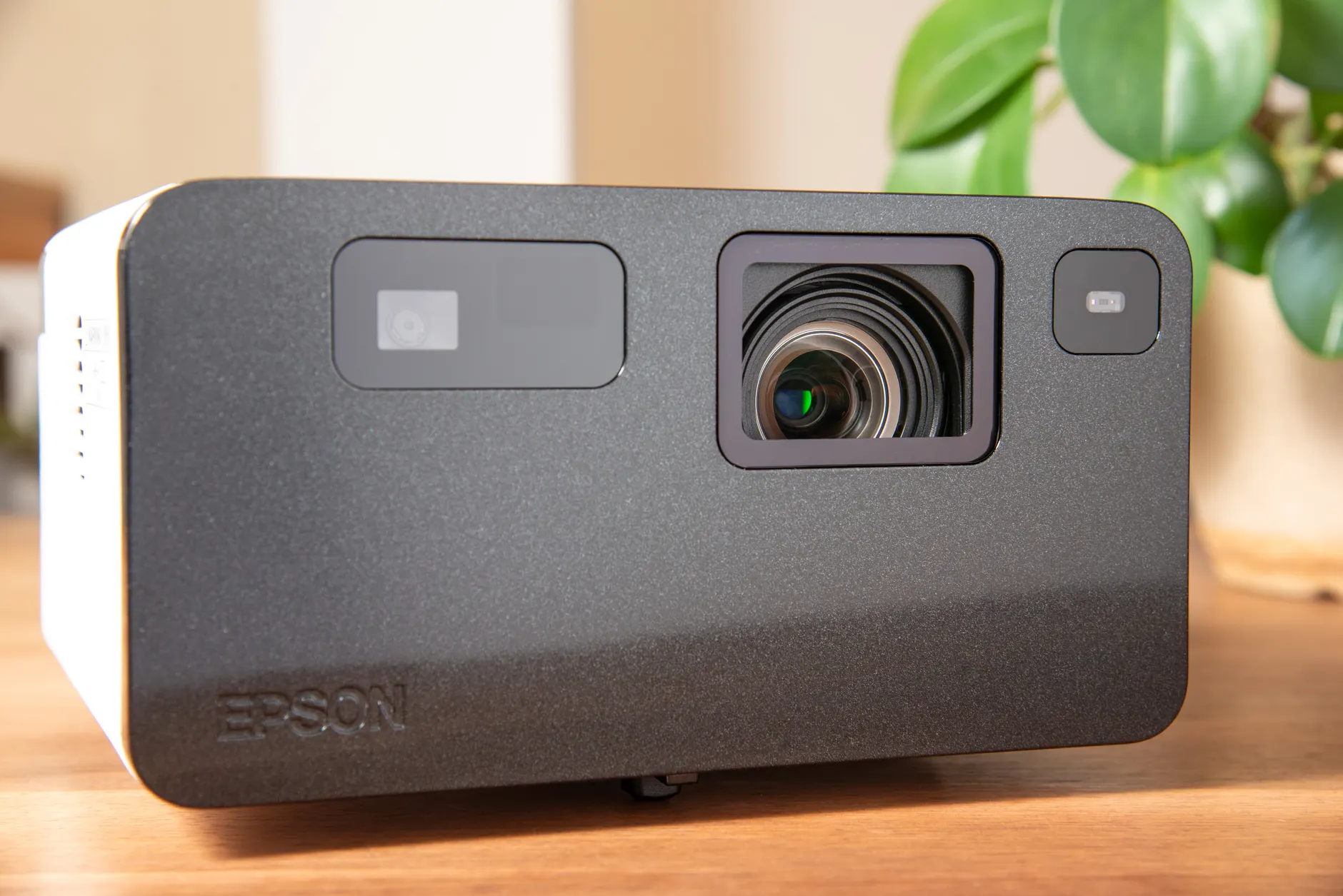 Hero image of Clean product shot of the Anker Nebula Capsule 3 portable mini projector, ideally on a neutral background or projecting onto a surface, showing the cylindrical form factor clearly