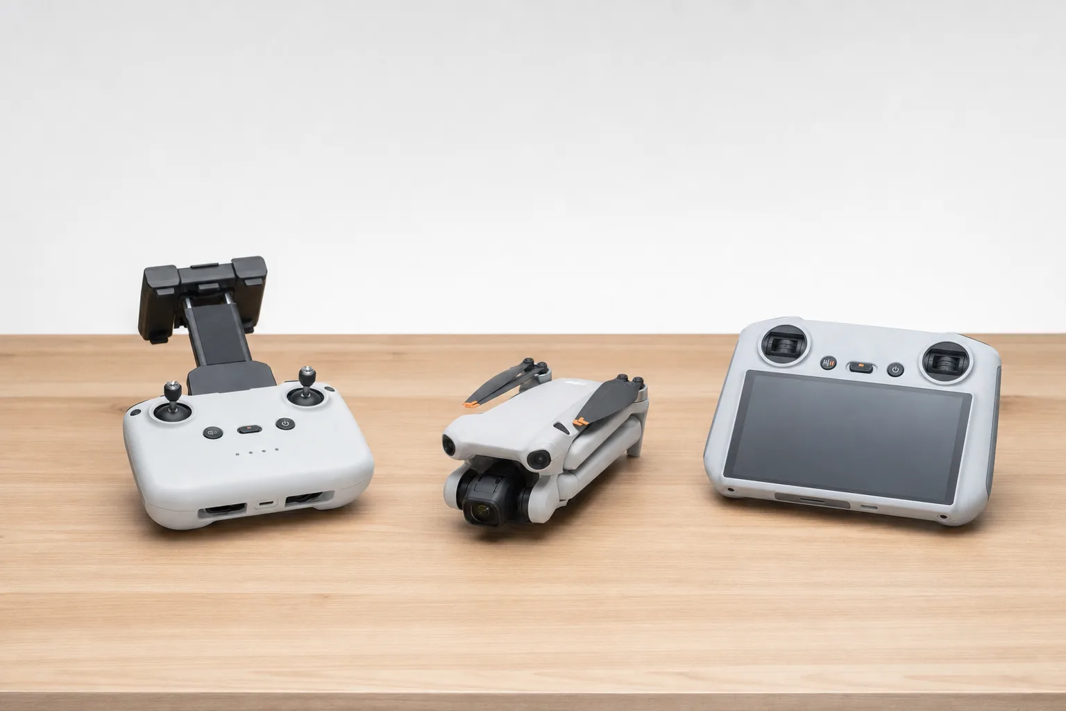 DJI Lito drone beside RC-N3 and RC 2 controllers