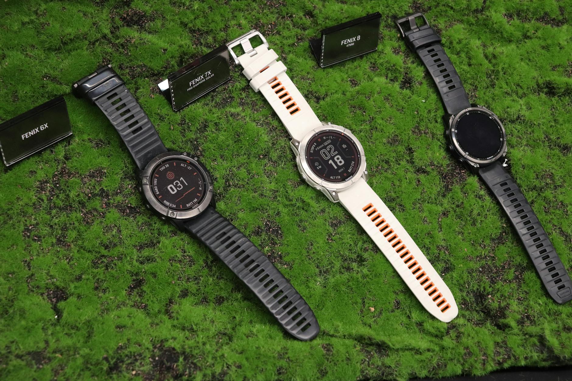 Garmin Fenix Series image of Close up hands-on photo of the Garmin Fenix 7 on a wrist, clearly showing the rugged design, titanium bezel and display face