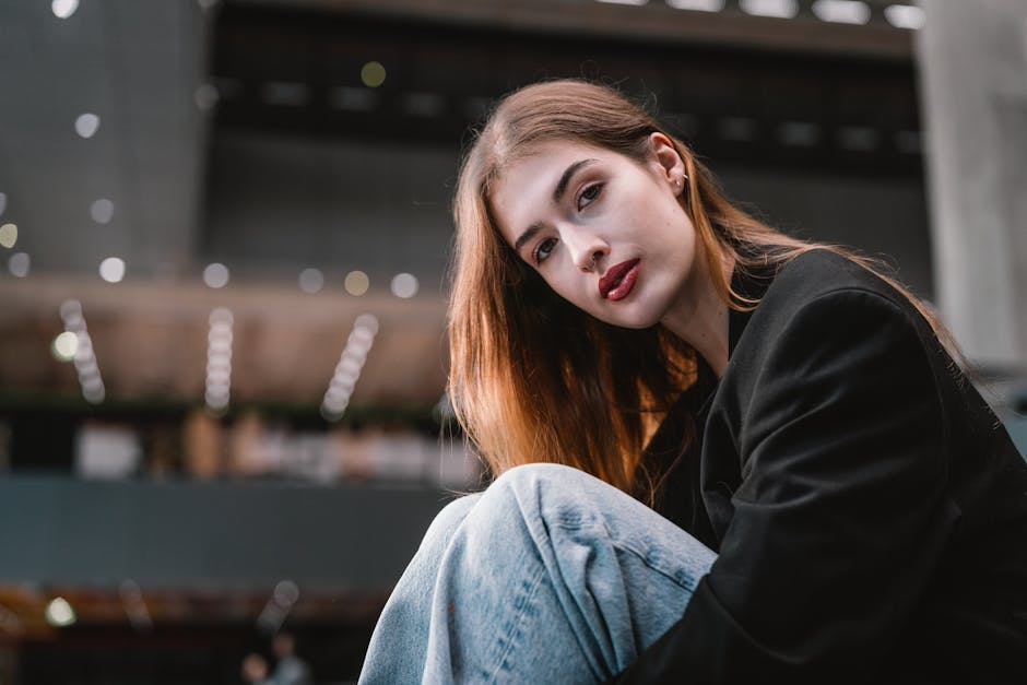 Stylish woman in Vienna with modern fashion vibes and city backdrop.