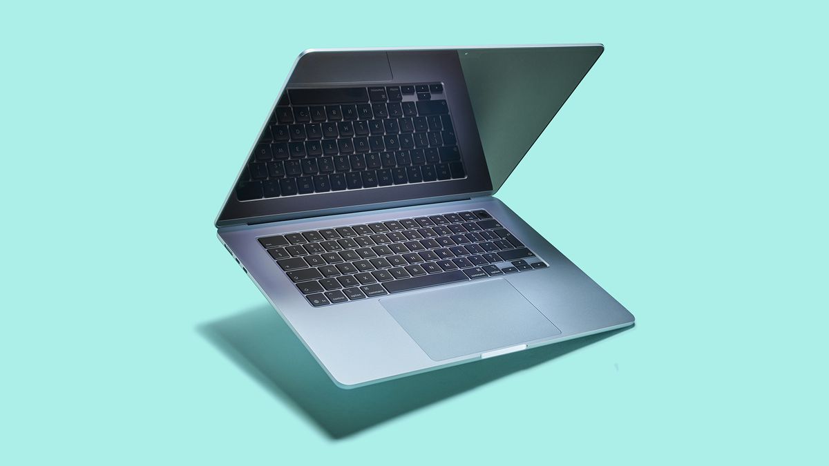 Accessories image of MacBook Air M4 being unboxed with the included accessories such as the charging cable and adapter visible alongside the laptop