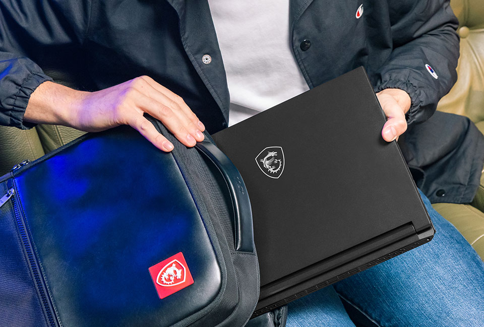 Performance & Gaming image of Real-world photo of a person using the MSI Stealth 16 AI Plus 2026 for gaming or intensive tasks, showing the screen with active content